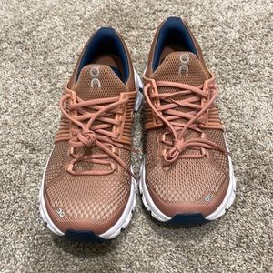 On running tennis shoes. Never worn.